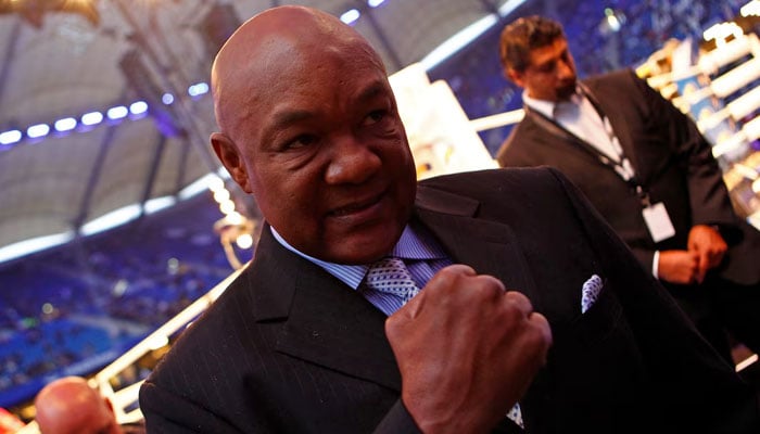 Former heavyweight champion George Foreman gestures before the heavyweight title unification boxing match between Ukraines Vladimir Klitschko and Britains David Haye in Hamburg July 2, 2011. — Reuters