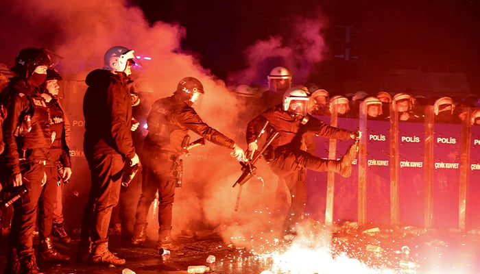 A police officer pours water during a protest by students against the detention of Istanbul Mayor Ekrem Imamoglu, in Istanbul, Turkey, March 21, 2025. — Reuters