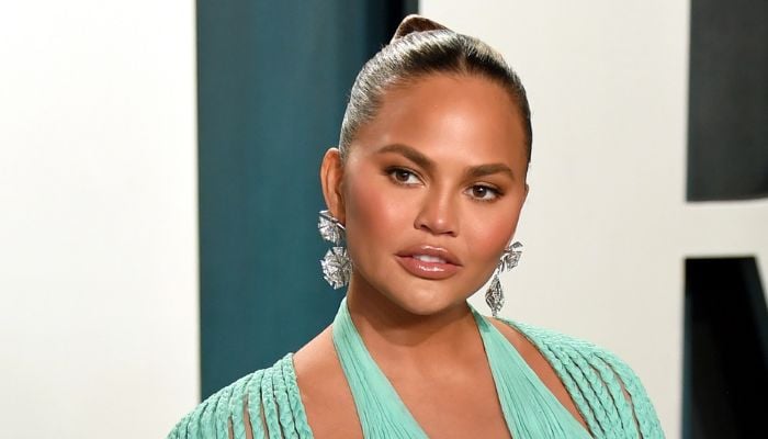 Chrissy Teigen’s closet chaos ends in a brutal injury