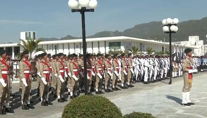 Armed forces personnel stand guard during the Pakistan Day parade at Aiwan-e-Sadr in Islamabad on March 23, 2025. — Screengrab via Geo News