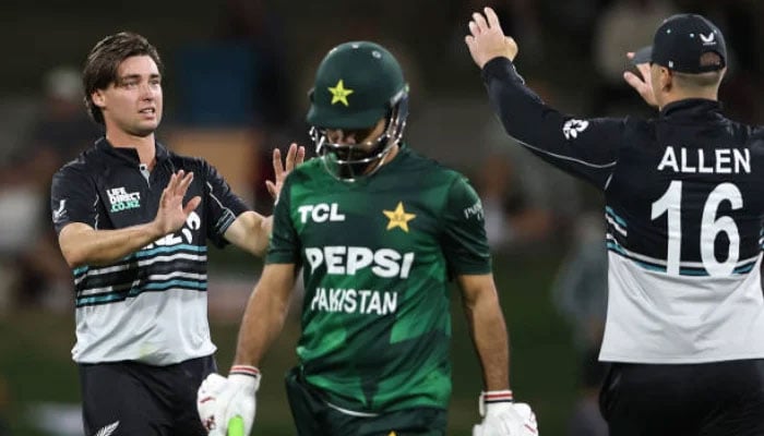 Zakary Foulkes of New Zealand (L) celebrates his wicket of Irfan Khan of Pakistan during game four of the Mens T20 series against Pakistan at Bay Oval, on March 23, 2025, in Mount Maunganui. - AFP