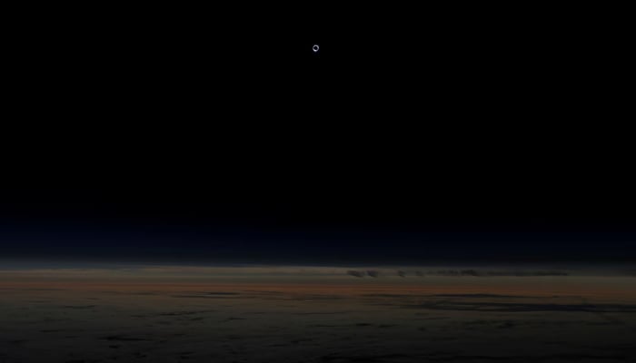 The sun is obscured by the moon during a solar eclipse as seen from an Alaska Airlines commercial jet at 40,000 feet above the Pacific Ocean off the coast of Depoe Bay, Oregon. — Reuters/File