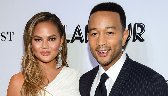 Chrissy Teigen and John Legend adopt dog rescued after LA fires