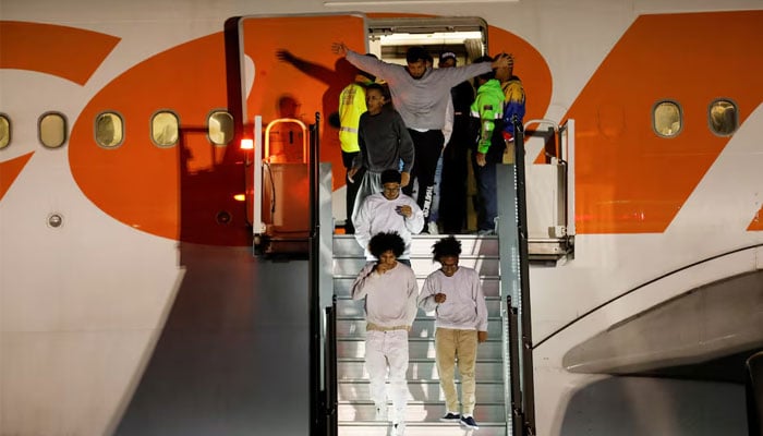 Venezuelan migrants arrive on a flight after being deported from the United States, in Caracas, Venezuela, March 24, 2025. — Reuters