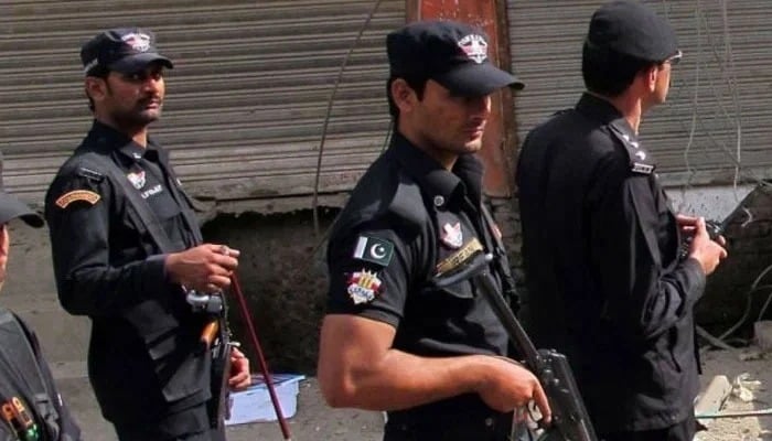 KP Police personnel patrol area after an attack in KP. — AFP/File