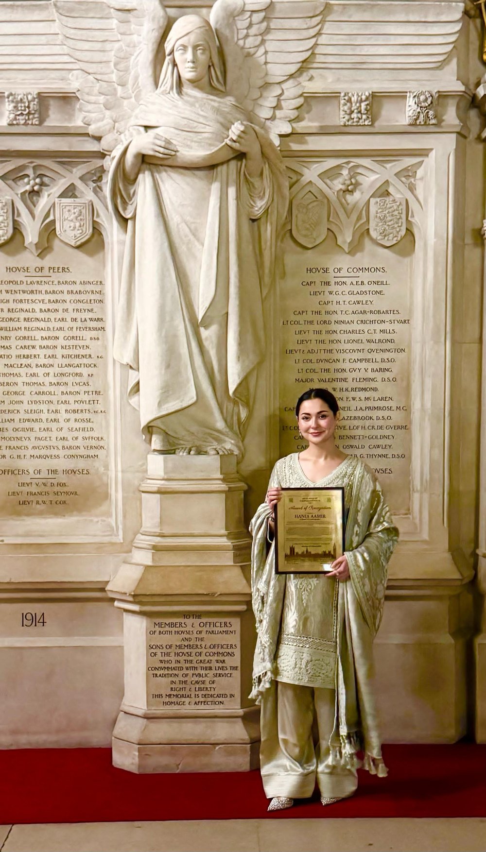 Acclaimed actress Hania Aamir poses with her award at the UK Parliament. — Reporter